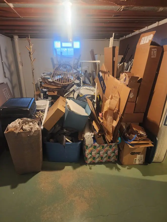 Roll-off dumpster container at job site for Yard Waste Dumpster Rental in Poteau